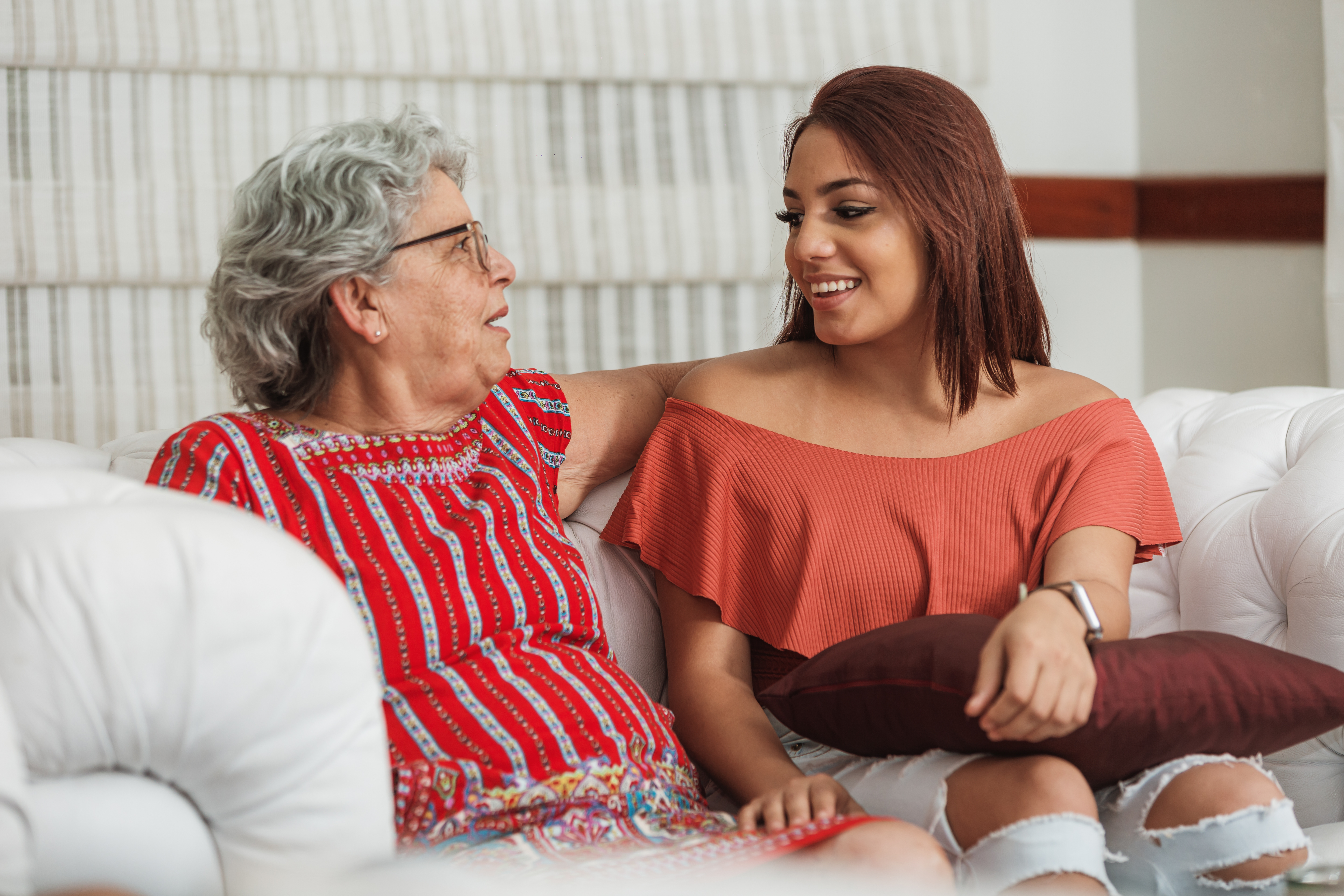 Latino grandparent with teenager